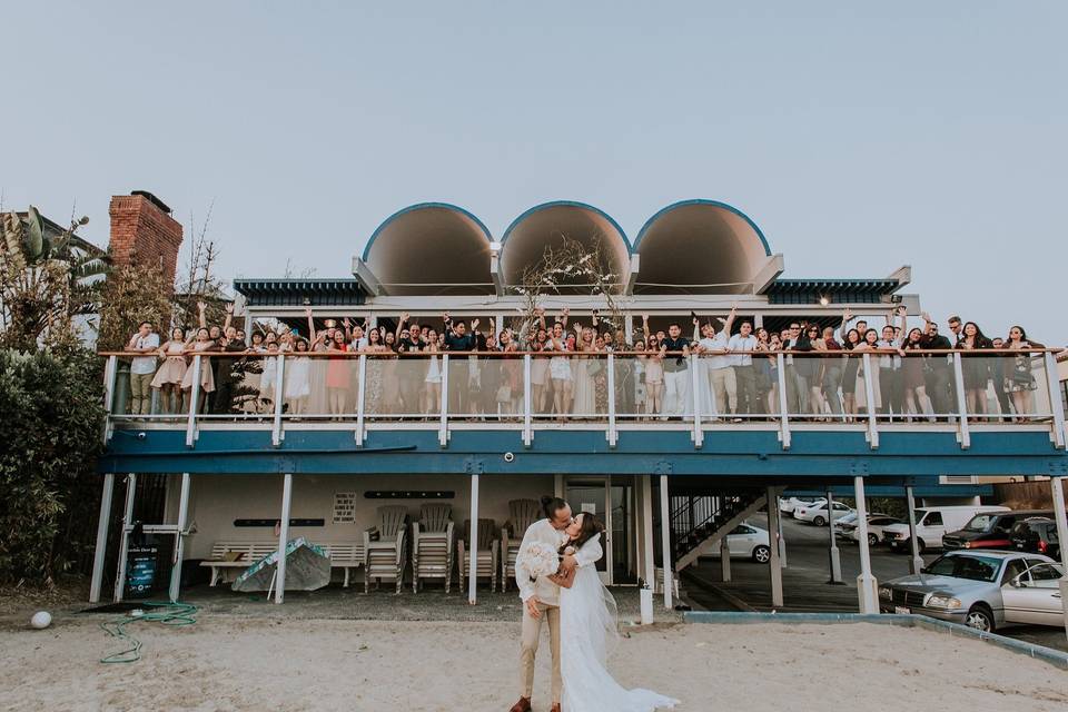 Newlyweds kissing