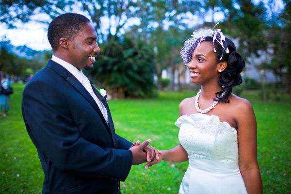 A close-up shot of Melissa's beautiful wedding day look as she smiles at her groom. She chose to wear traditional make-up. Photography: Ryan Lue-Clarke