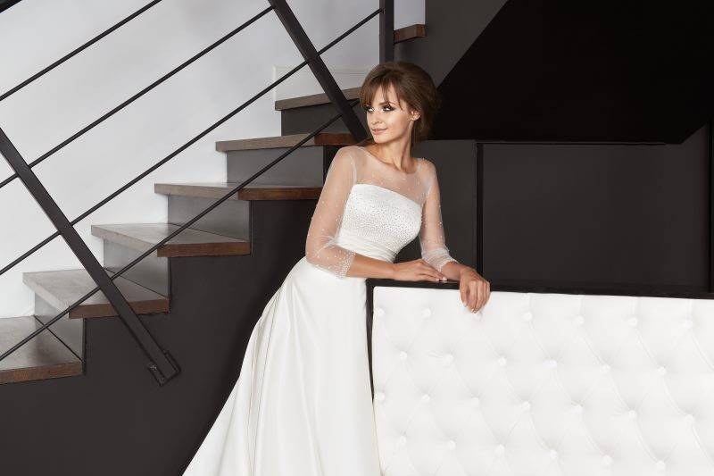White Gucci Suit and L'Fay Bridal Gown