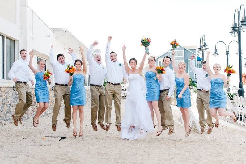 The couple with the bridesmaids and groomsmen