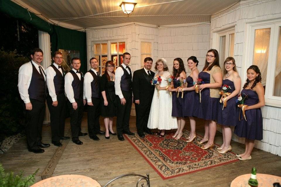 The couple with the bridesmaids and groomsmen