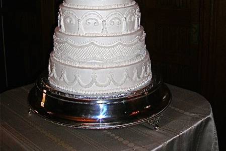 6-tier buttercream cake iced in 