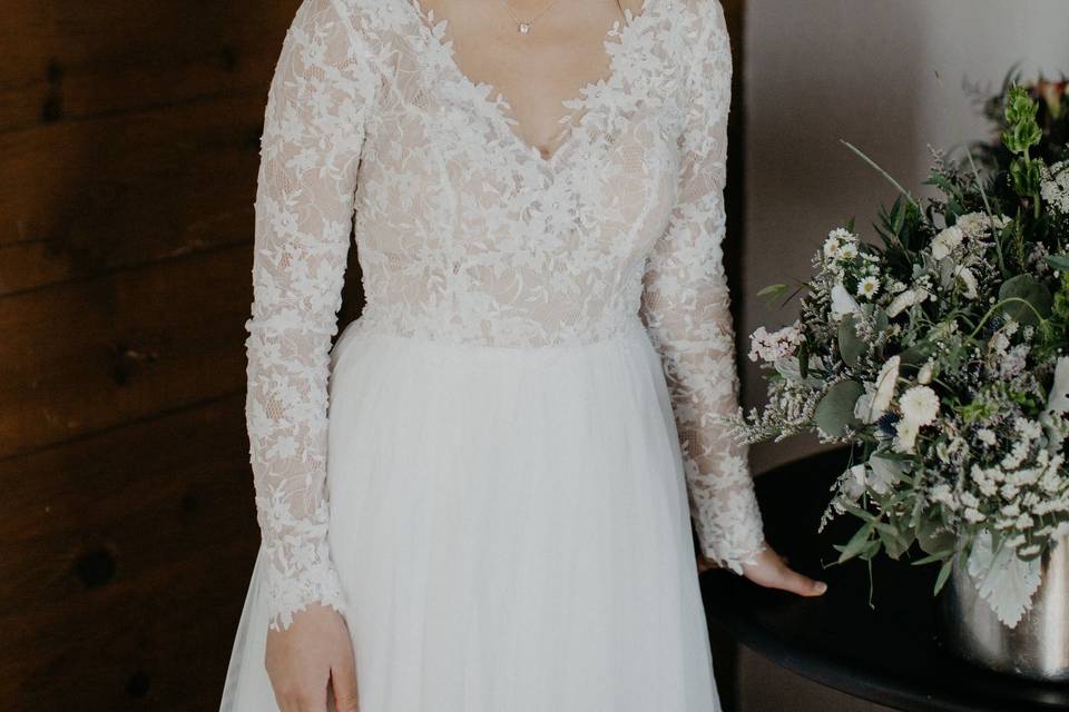 Bride in a sleeved lace dress
