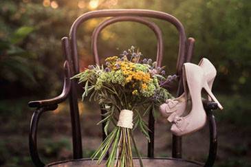 Bridal shoes and flower bouquet