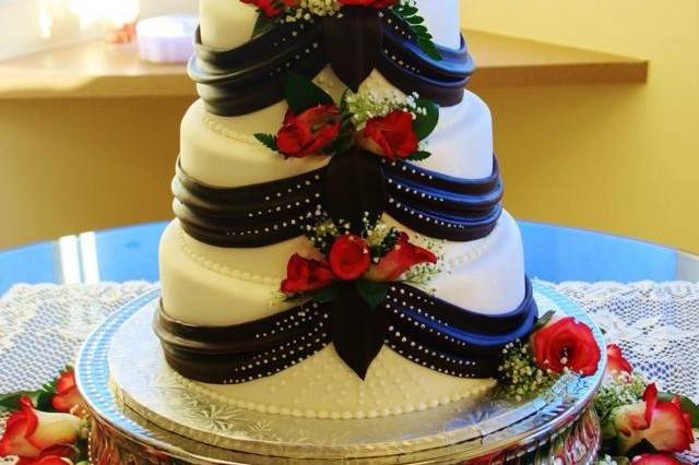 4-tier floral cake with black detailing
