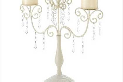 Mini Chandelier Votive Stand - Uniquely beautiful tabletop stand boasts two hanging votive “chandeliers”. Glittering crystals and curving lines delight the eye! Uses votive candles (not included). Metal and glass with acrylic drops. 13