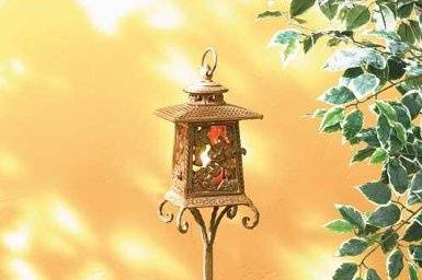 White Scrollwork Bird Cage Candle Lantern - Bright white and intricate floral filigree add fresh appeal to this birdcage lantern! As candlelight shines through the cutout panels in a kaleidoscope display, your porch or patio comes alive with jubilant points of light! Candle not included. Metal. 4 1/4