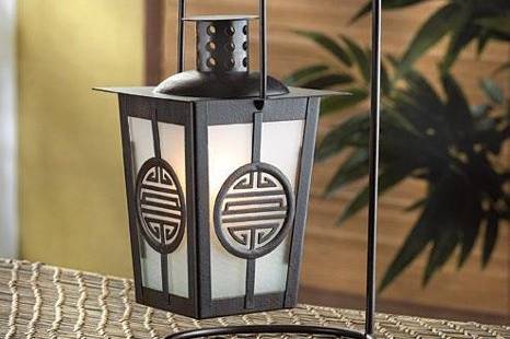 Classic Matte Black Contemporary Candle Lantern - Square glass paned lantern gets geometric appeal from a simple silhouette and classic matte black finish. Safely houses a stately pillar candle for hours of enchanting light! Loop at top for hanging