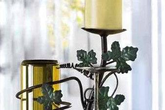 Asian Style Frosted Glass Panel Candle Lantern - Twinkling light gleams hauntingly behind each frosted glass panel, casting a beautiful back light for an intricate circular Asian medallion. Reminiscent of the centuries old lamps still in use today, this hanging lantern invokes a feeling of timeless serenity and ageless distinction. Iron with glass panels. Candle not included. 5 1/2