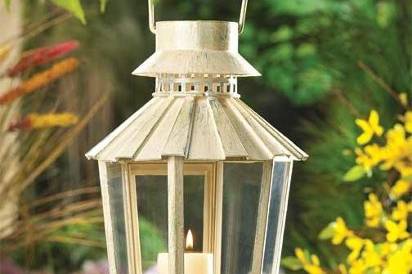 Moroccan Style Candle Lantern - Exotic metal candle lantern. Place several together for an ever changing display of dancing light! Uses votive candles (not included). 3 3/4