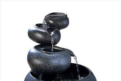 Elegant Fair Maiden Water Fountain - FREE Shipping! - A fetching fairy maid pours water in sparkling tiers down a series of open blossoms. Makes an elegant centerpiece for your garden! Comes with an electric water pump. UL Recognized. Fiberglass. 19 1/2