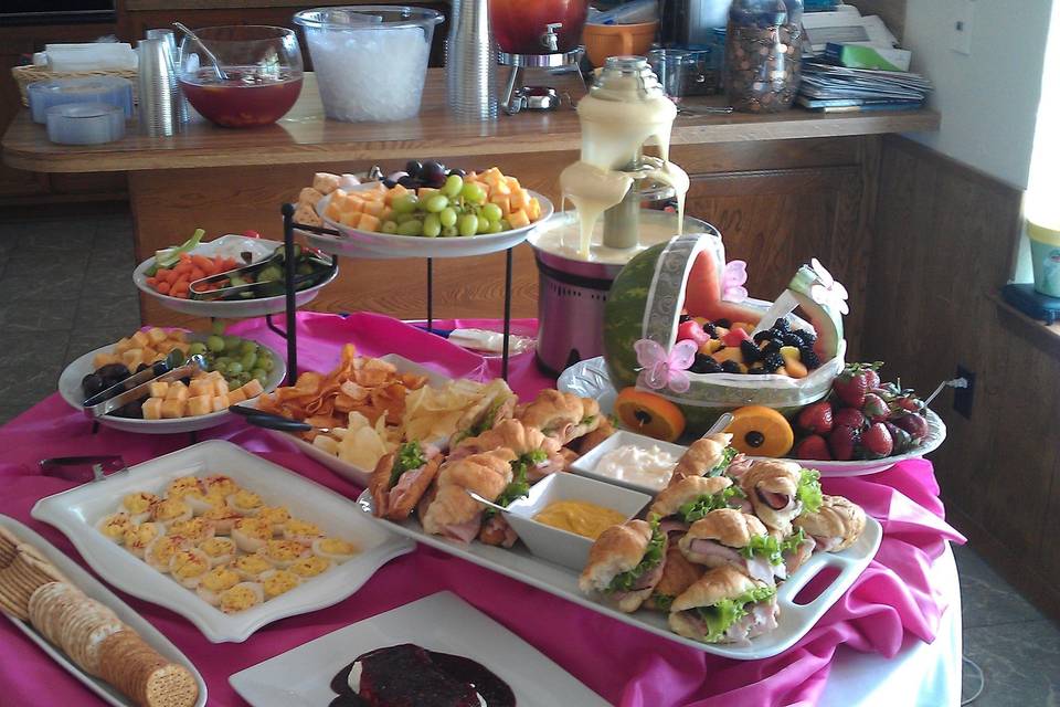 Assorted fruits, cookies and breads