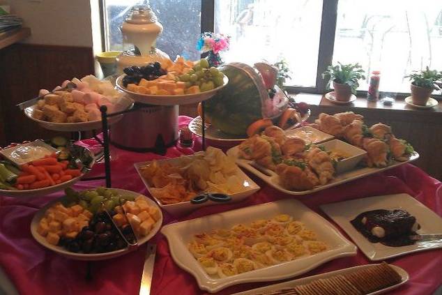 Assorted fruits, cookies and breads