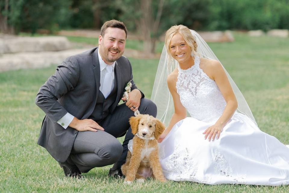 Bride and Groom with puppy