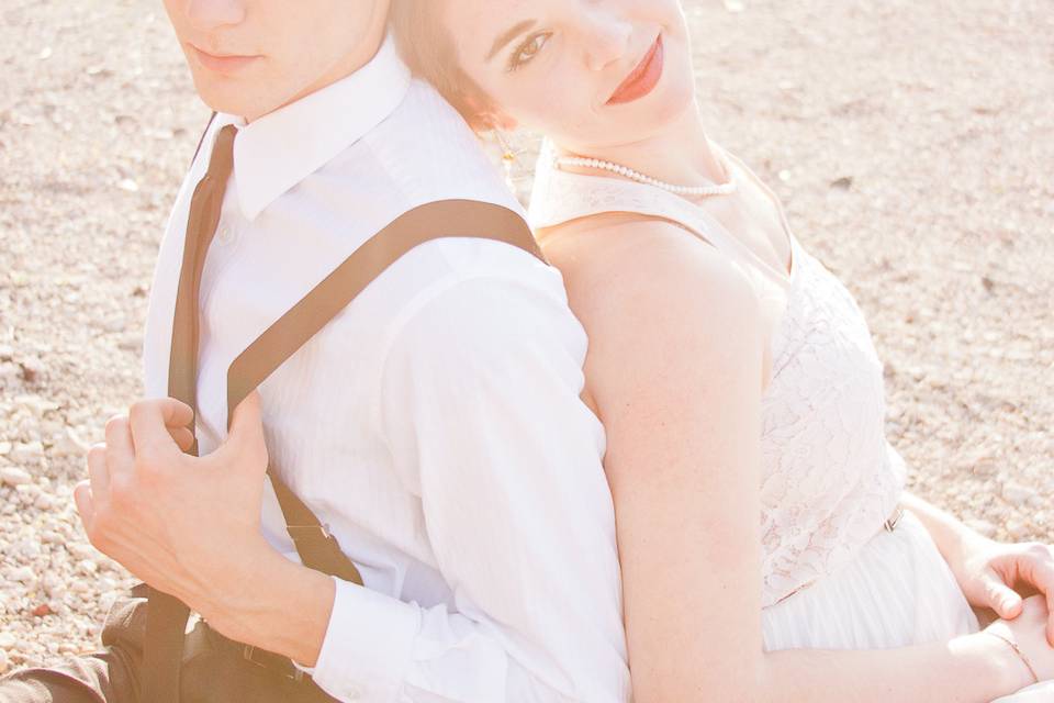 Black tie engagement session with that stunning sunset at the railroad tracks.
