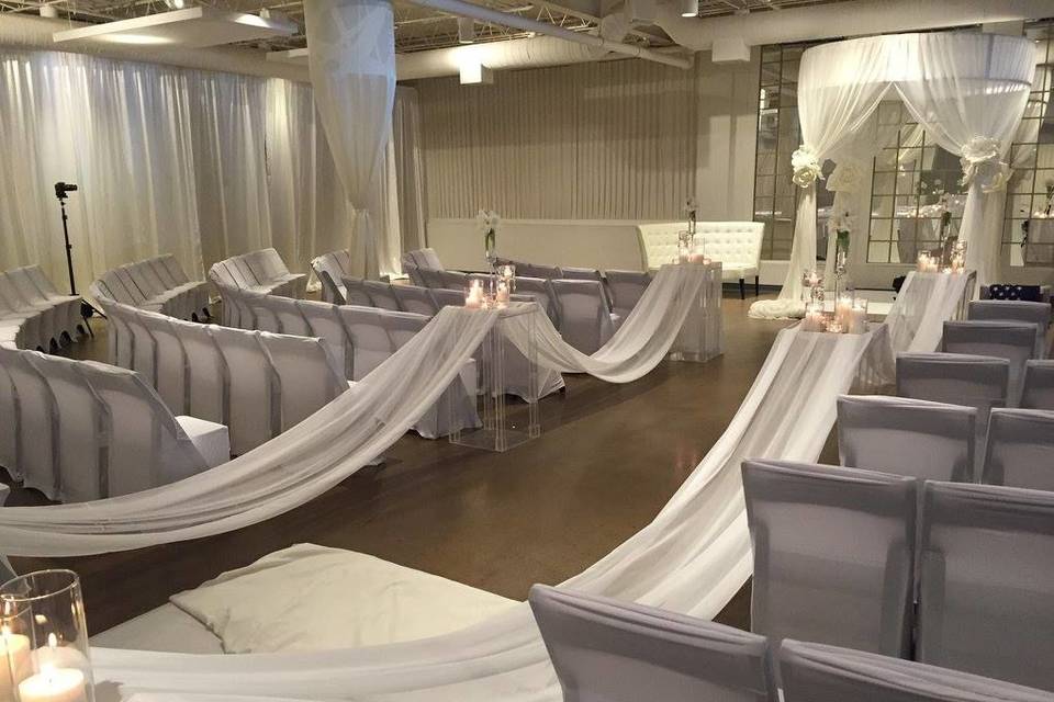 Indoor wedding ceremony setting