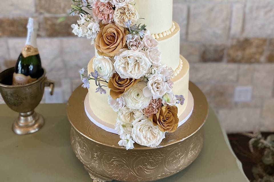 Cascading floral wedding cake