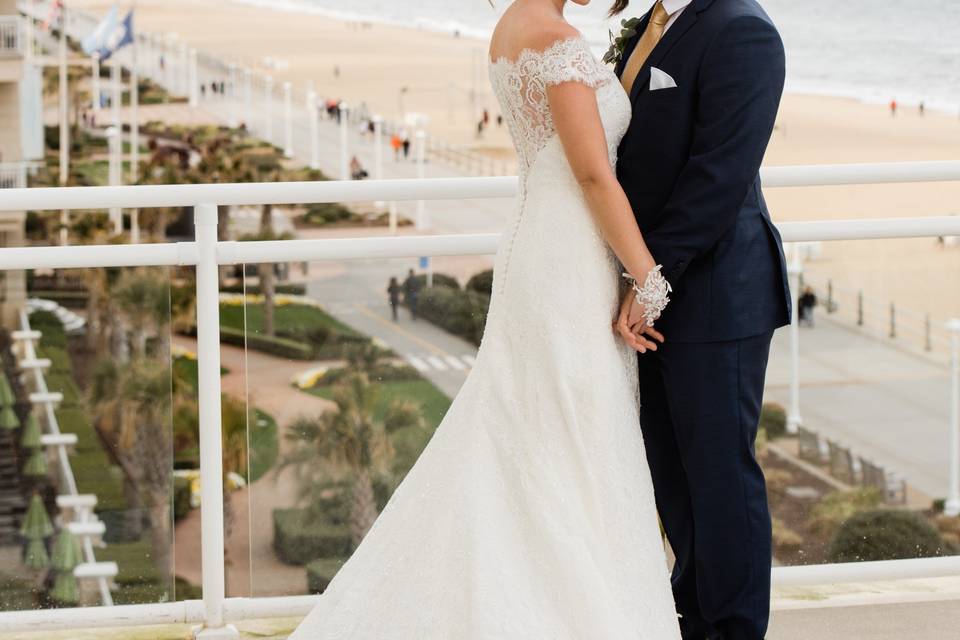 Couple posing on balcony