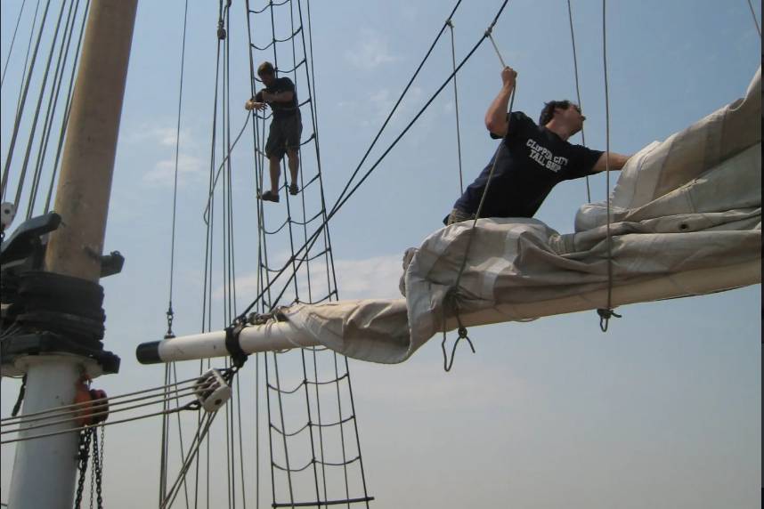 Crew working the sails