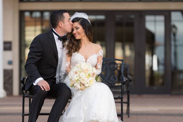 Groom kisses his bride