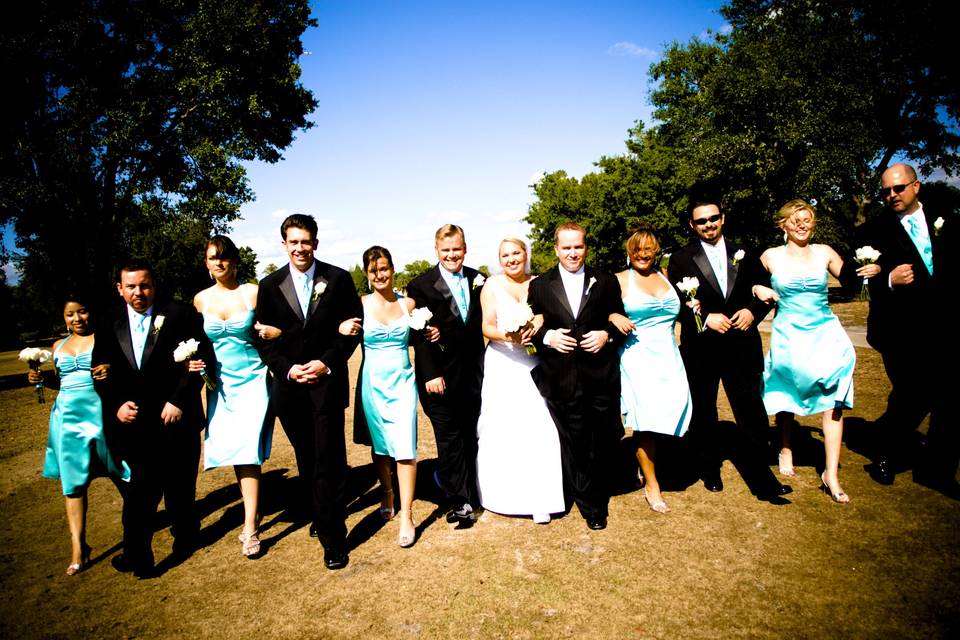 The couple with the bridesmaids and groomsmen