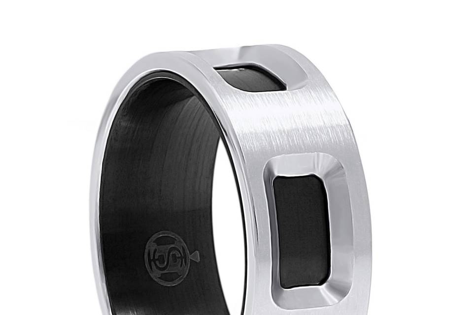 A contemporary men's ring that unites Cobalt with Black Zirconium perfectly. Circling this 8mm satin finish Cobalt band are beveled cut windows that display the Black Zirconium handsomely.Zirconium is an element and a metal similar to Titanium. Zirconium is unique in that when heated it turns black in color and the surface of the metal is hardened, much like a ceramic surface.Cutting edge style combined with comfort fit make this the contemporary mans choice.