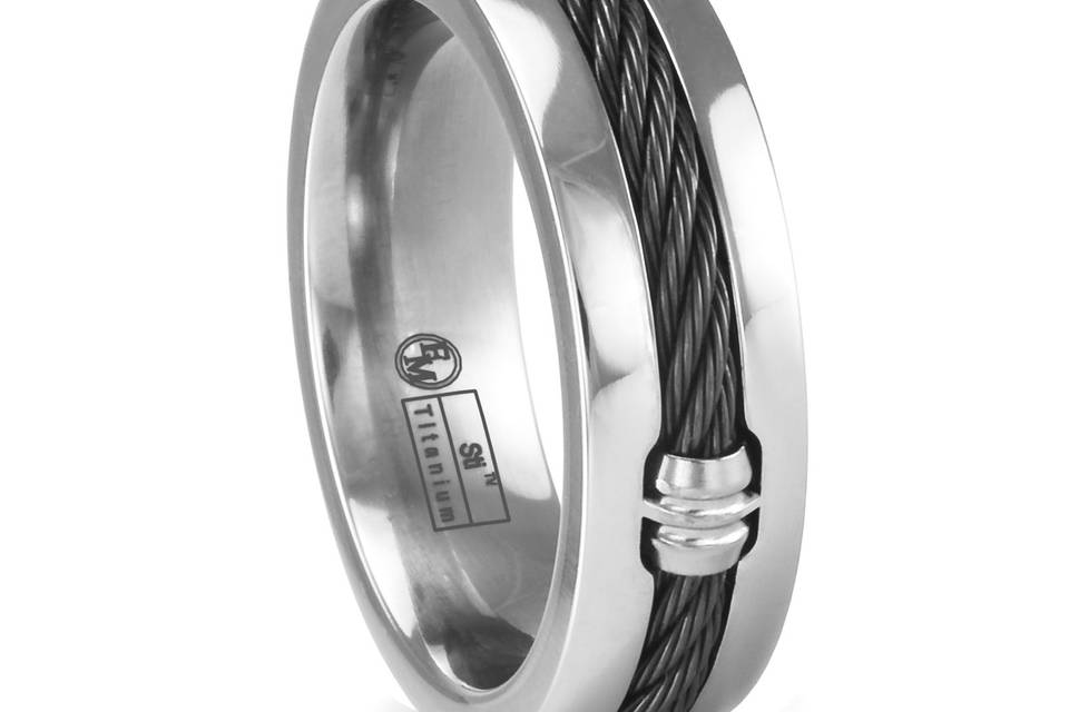 This 7mm wide titanium ring has an industrialized look to it. Inlaid in the center is a strip of black titanium cable which goes all the way around the ring. Evenly spaced there are four titanium barrel connectors.