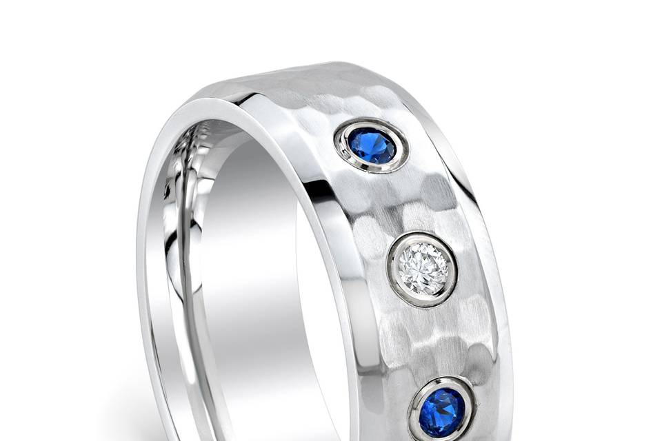 Customize your own wedding band.  Choose the gemstones and metal.  Uniquely your own design!