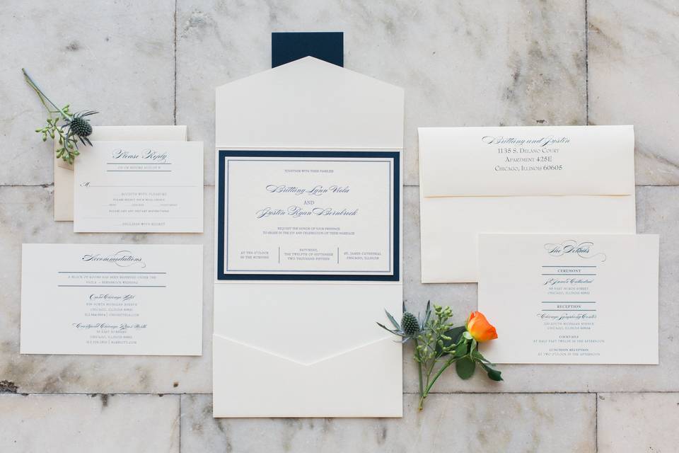 White invitation with blue border