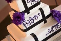 Deep purple lisianthus on the cake