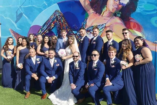 Bride and groom with their crew