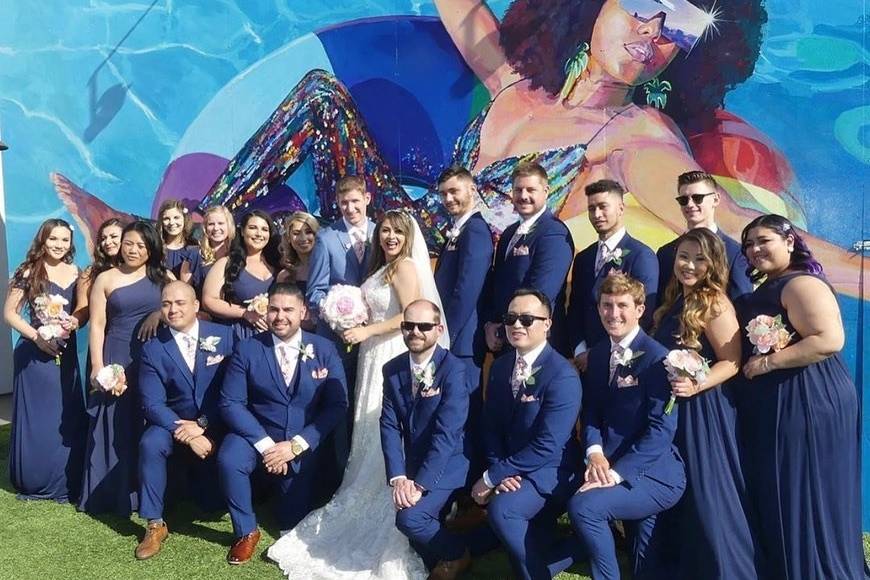Bride and groom with their crew