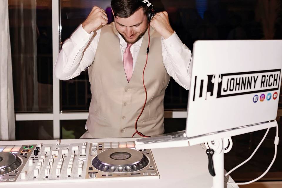 Groom DJing