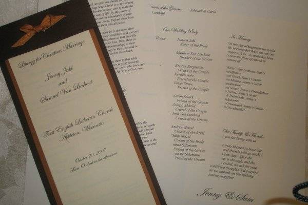 Tower Program in Chocolate brown and rust with ivory pages.  All tied together with a deep golden bow.  This design would also be terrific as a menu card for your reception.