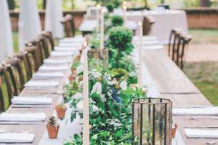 Greenery garland plus soft candlelight
