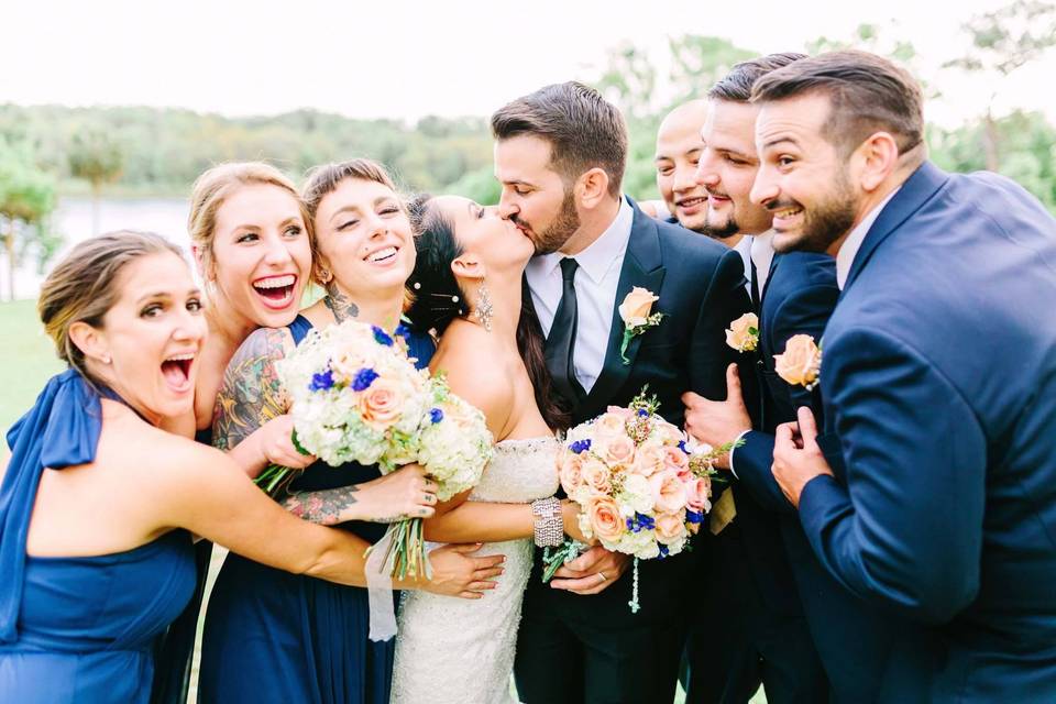 The couple with the bridesmaids and groomsmen