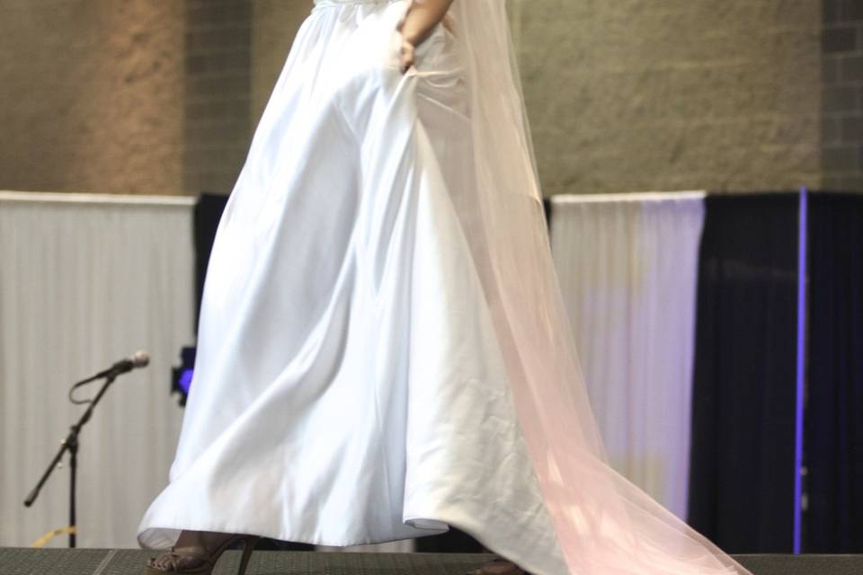 Single tier white and pink ombre chapel length tulle veil with swarovski crystals at bottom.