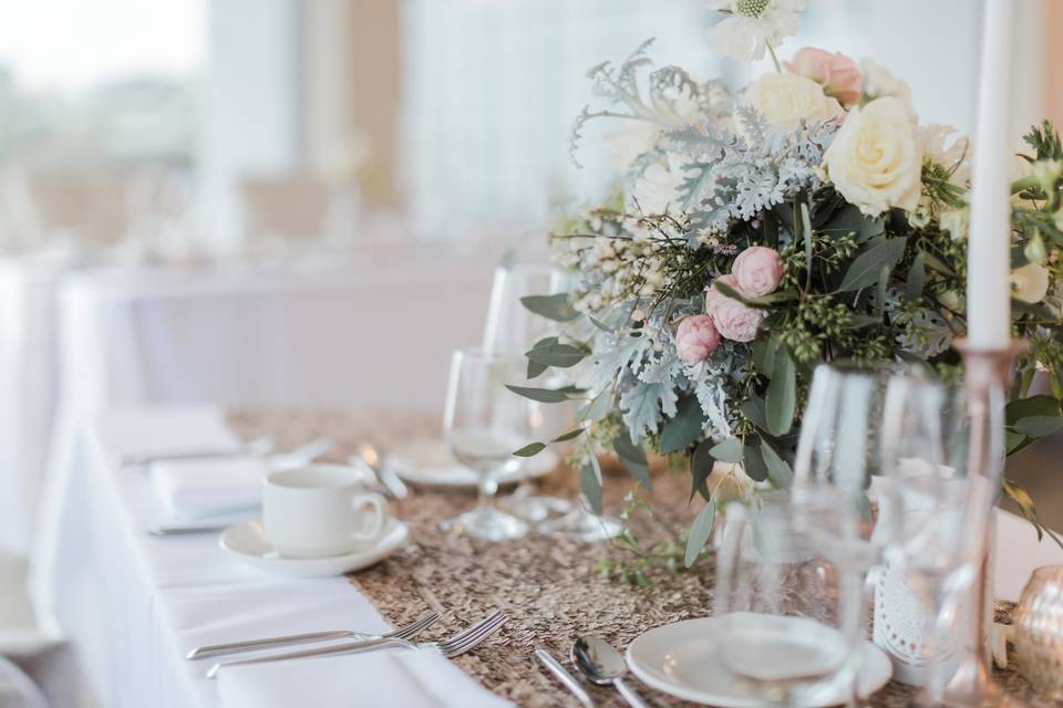 Table setting and floral centerpiece