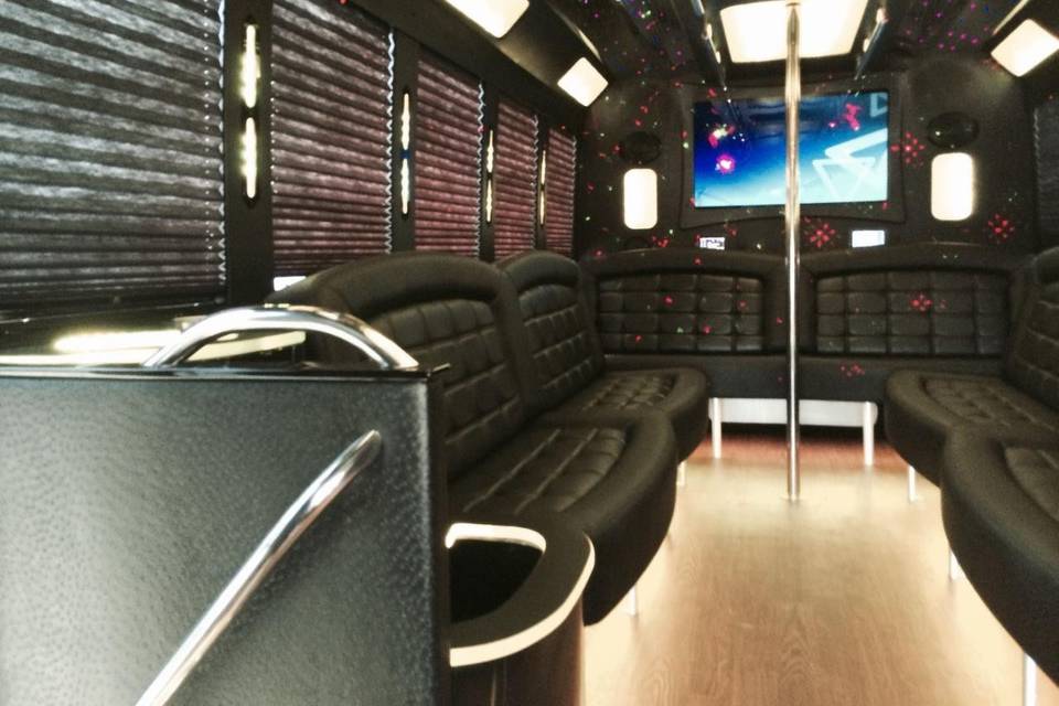 Limo bus interiors with removable dance pole