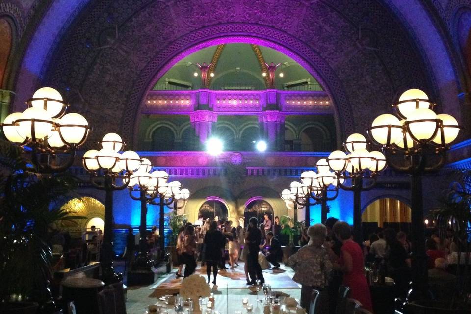 Amazing color changing LED wedding reception lighting in purple and blue, with moving lights and sound for live band. At St. Louis Union Station.