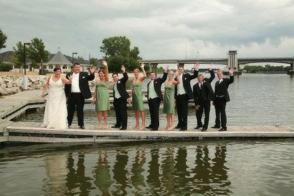 The couple with the bridesmaids and groomsmen