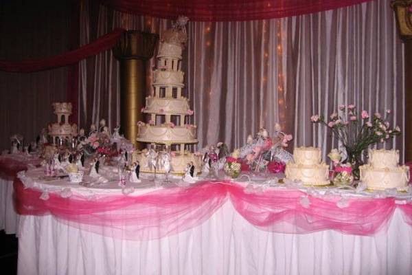 This cake was at a wedding I did in Portland, Or It was displayed on a stage and was enough for 600 people. I didn't have a wide angle lens so I only got half of the cake in the photo.