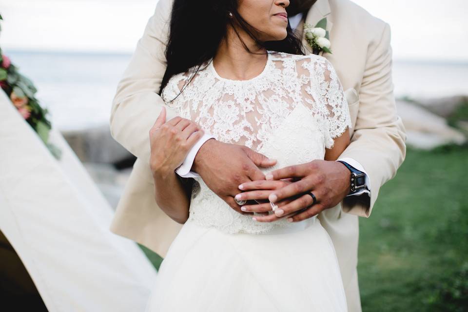 Groom holding the bride in his arms