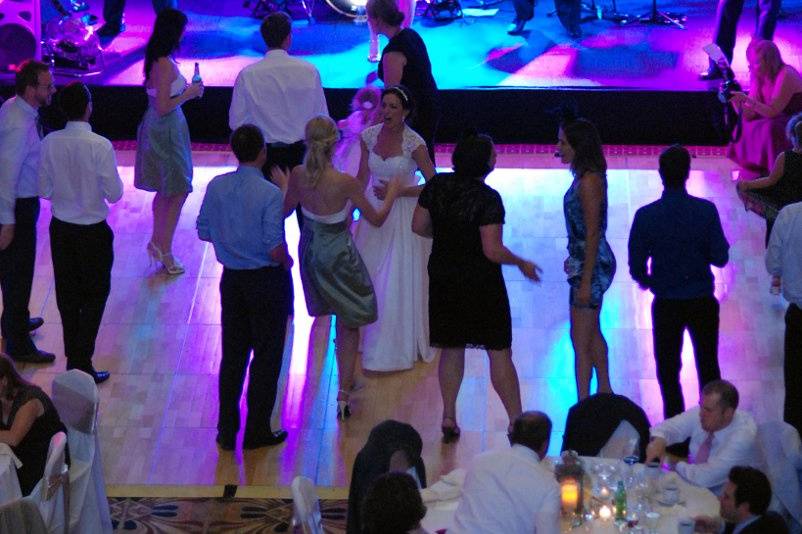 Bride and guests dancing