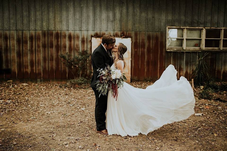 Bride and groom kissing