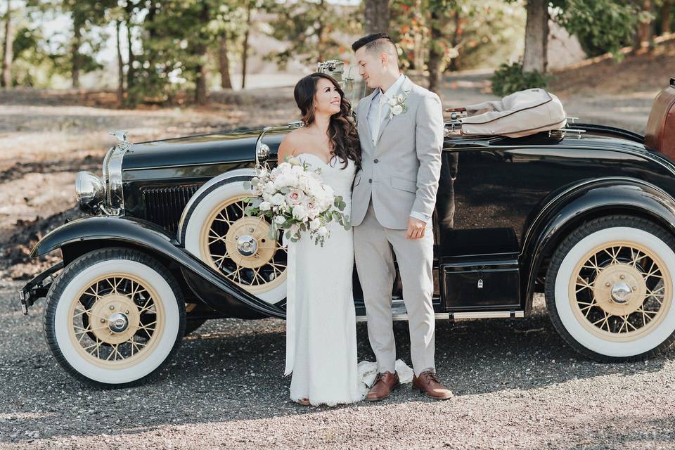 Couple with classic car