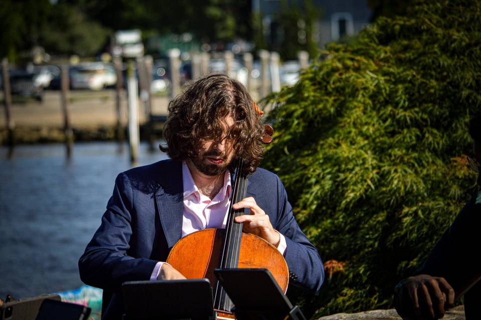 Solo cello by the docks