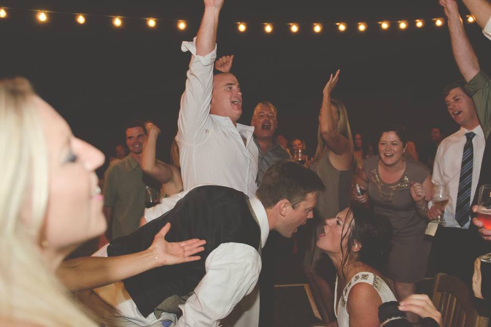 Couple and guests dancing