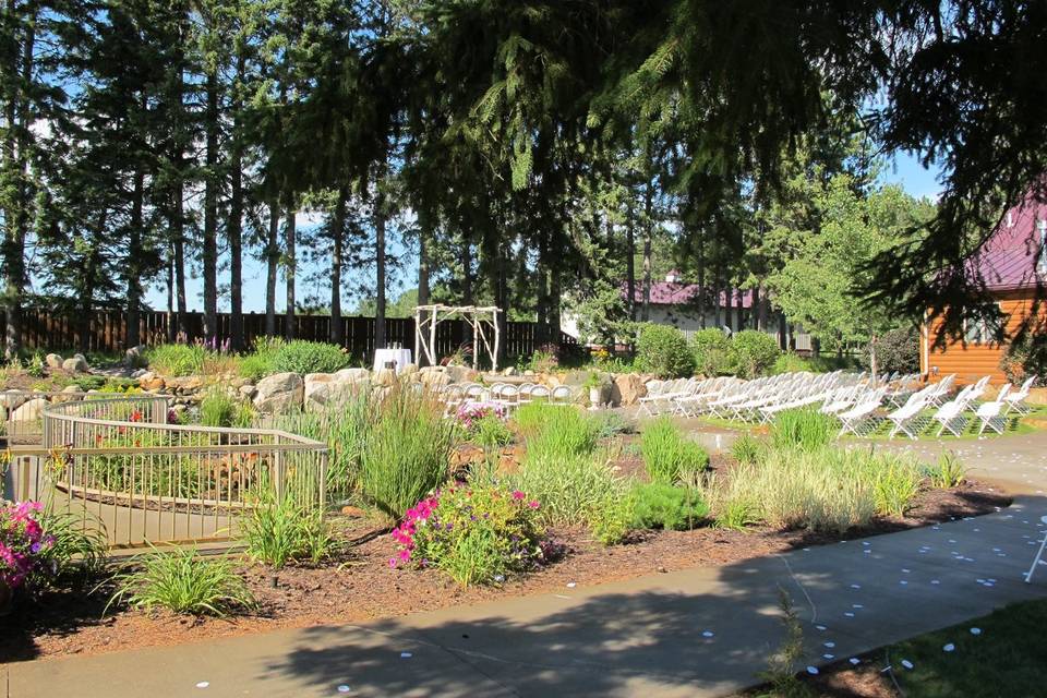 Pond and Wedding Arch at Pine Peaks Event Center a member of Wedding Wire, The Knot, Brainerd Wedding Association, Twin Cities Bridal Show.