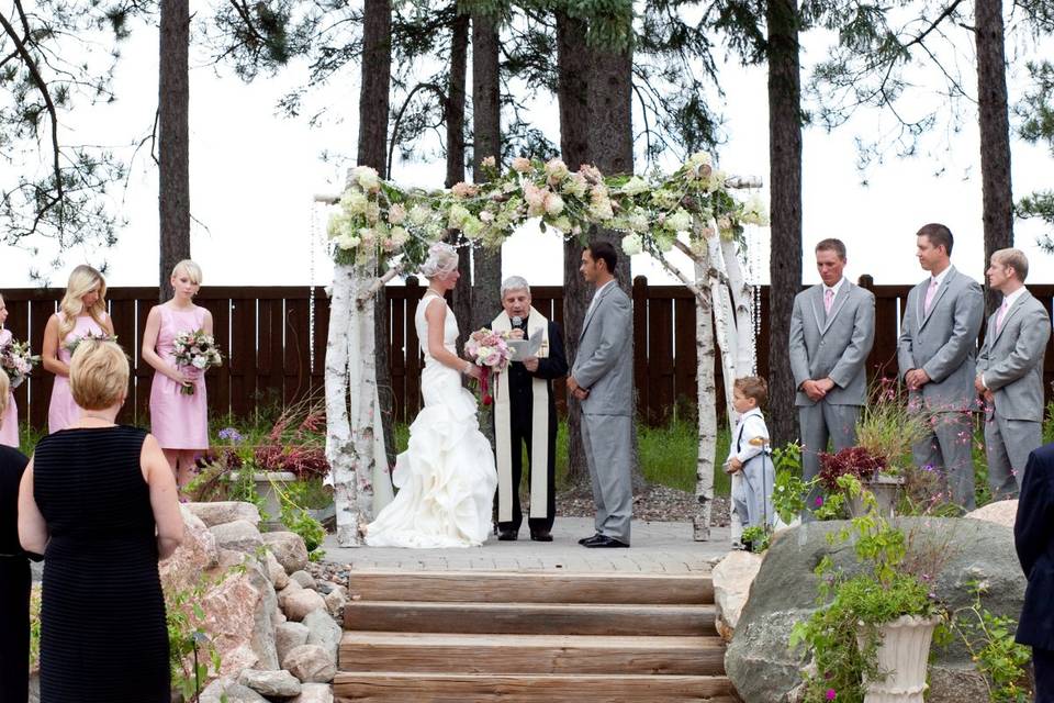 Rene and Ellen at their outdoor wedding Ceremony at Pine Peaks Event Center a member of Wedding Wire, The Knot, Brainerd Wedding Association, Twin Cities Bridal Show.  Photo By Kelli Engstrom Photography